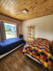 En eller flere senge i et værelse på CasaQH