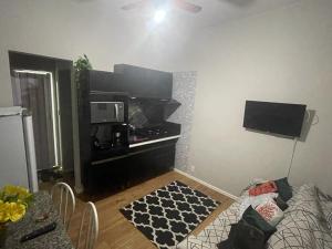 A cozinha ou cozinha compacta de Apartamento na Praia do Forte em Cabo Frio apto N113