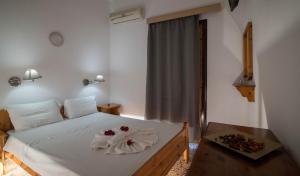 Letto o letti in una camera di Minoa sea rooms