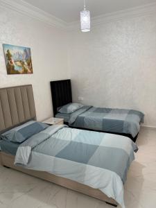 Uma cama ou camas num quarto em Tetouan Relax Apartement