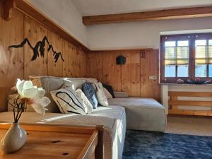 Ένα ή περισσότερα κρεβάτια σε δωμάτιο στο Marianne - Alpine Apartments