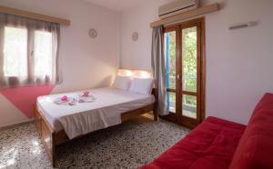 Letto o letti in una camera di Minoa sea rooms