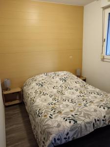Postel nebo postele na pokoji v ubytování Les Hauts de Balaruc