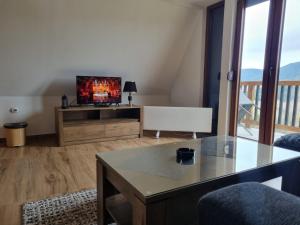 TV o dispositivi per l'intrattenimento presso Androv kutak