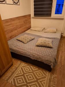 Posteľ alebo postele v izbe v ubytovaní NightHost Robotnicza 32 m 328 Wrocław free parking