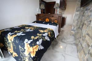 Postel nebo postele na pokoji v ubytování Hôtel d’lyon