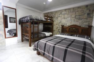 Postel nebo postele na pokoji v ubytování Hôtel d’lyon