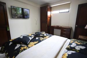 Postel nebo postele na pokoji v ubytování Hôtel d’lyon