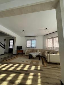 Coin salon dans l'établissement Pensiunea Elena