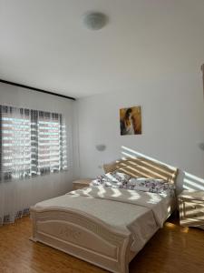 Un ou plusieurs lits dans un hébergement de l'établissement Pensiunea Elena