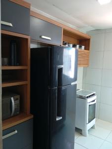 Kuchyň nebo kuchyňský kout v ubytování Casa privê muito aconchegante