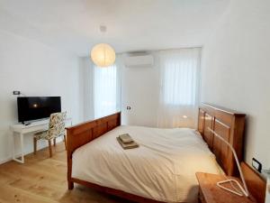 Voodi või voodid majutusasutuse Agriturismo Casa Bregalda toas
