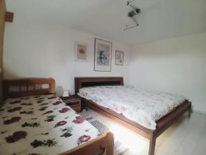 Posteľ alebo postele v izbe v ubytovaní Apartment an der Hutweide