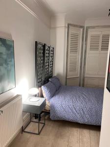 Ένα ή περισσότερα κρεβάτια σε δωμάτιο στο Bournemouth. Private Self Contained space.