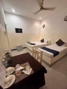 Postel nebo postele na pokoji v ubytování Varadero Zanzibar Hotel