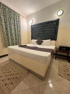 Postel nebo postele na pokoji v ubytování Varadero Zanzibar Hotel