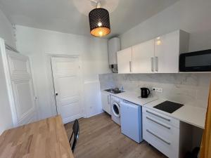 Kuchyň nebo kuchyňský kout v ubytování Studio Cosy Charme Ancien + 3 fotografie