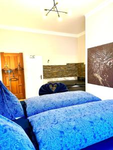 Posteľ alebo postele v izbe v ubytovaní Belvedere Apartment