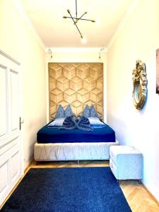 Posteľ alebo postele v izbe v ubytovaní Belvedere Apartment