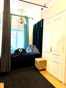 Posteľ alebo postele v izbe v ubytovaní Belvedere Apartment