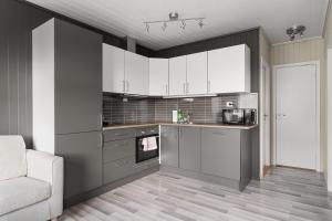 Kuchyň nebo kuchyňský kout v ubytování ARCTIC HOMES - Nordic Oasis