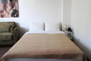 Postel nebo postele na pokoji v ubytování Gavrila Principa Apartment