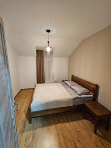 Voodi või voodid majutusasutuse Cottage Timotea toas