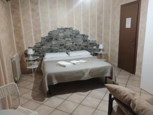 Postel nebo postele na pokoji v ubytování b&b ar colle 2 + 12 fotografií