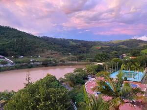 a view of a river with a resort at Cavalinho Branco 215 in Águas de Lindóia