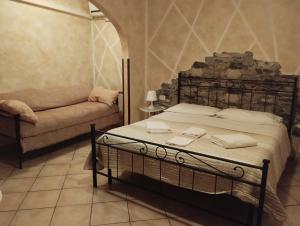 Postel nebo postele na pokoji v ubytování b&b ar colle 2