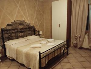 Postel nebo postele na pokoji v ubytování b&b ar colle 2