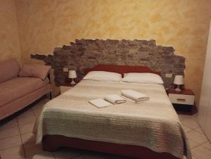 A bed or beds in a room at Beds Ar Colle
