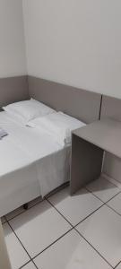 Postel nebo postele na pokoji v ubytování Hotel Andorinha