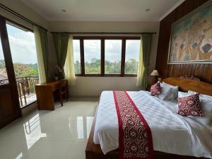 Postel nebo postele na pokoji v ubytování Brata Cottage Ubud + 37 fotografií