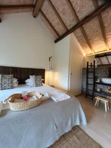 Cama ou camas em um quarto em Villa Margaridi