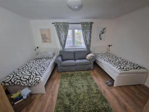 Postel nebo postele na pokoji v ubytování Haus mit Garten, U Bahn Nähe, gratis Parkplätze + 18 fotografií