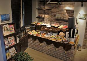 a buffet line with many different types of food at BC Residence Pangaldi in Istanbul