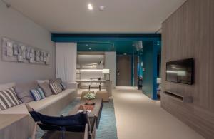 โทรทัศน์และ/หรือระบบความบันเทิงของ Veranda Resort Pattaya - MGallery Collection
