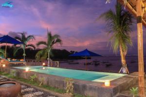 Πισίνα στο ή κοντά στο Seaside Huts Lembongan