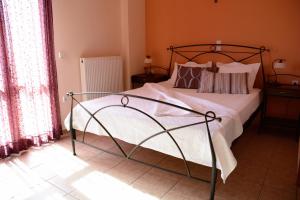 A bed or beds in a room at Asterida Villas