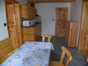 Kuchyň nebo kuchyňský kout v ubytování Apartmány Yellow