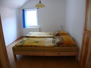 Postel nebo postele na pokoji v ubytování Apartmány Yellow