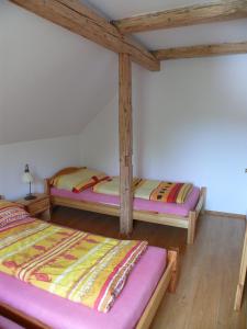 Postel nebo postele na pokoji v ubytování Apartmány Yellow