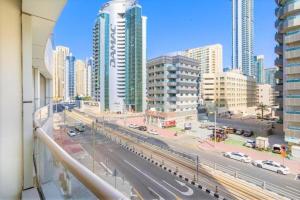 a view of a city with tall buildings and a street at Royal Manor- Marina Diamond 2 in Dubai