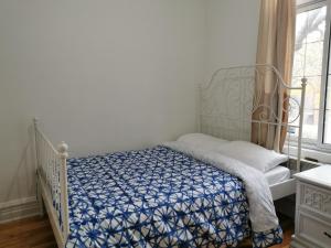 Katil atau katil-katil dalam bilik di Delightful room near Metro Monk station with Self Check-in
