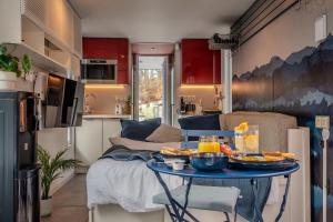 a small room with a table with food on it at Houseboat Prague with Paddle Boat -Sail, Explore and Relax in Prague +34 photos