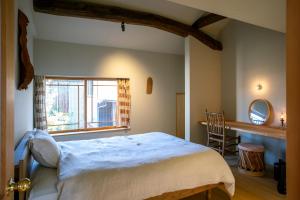 Postel nebo postele na pokoji v ubytování Une stay&diner