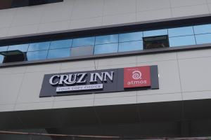 Un certificado, premio, letrero u otro documento en Cruz Inn calicut