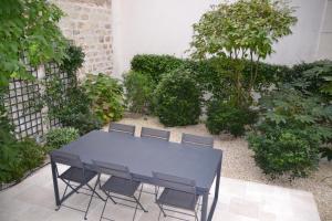 Vonkajšia záhrada v ubytovaní La Villa d'Auteuil, Paris 16, rénovée