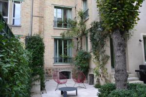 Vonkajšia záhrada v ubytovaní La Villa d'Auteuil, Paris 16, rénovée